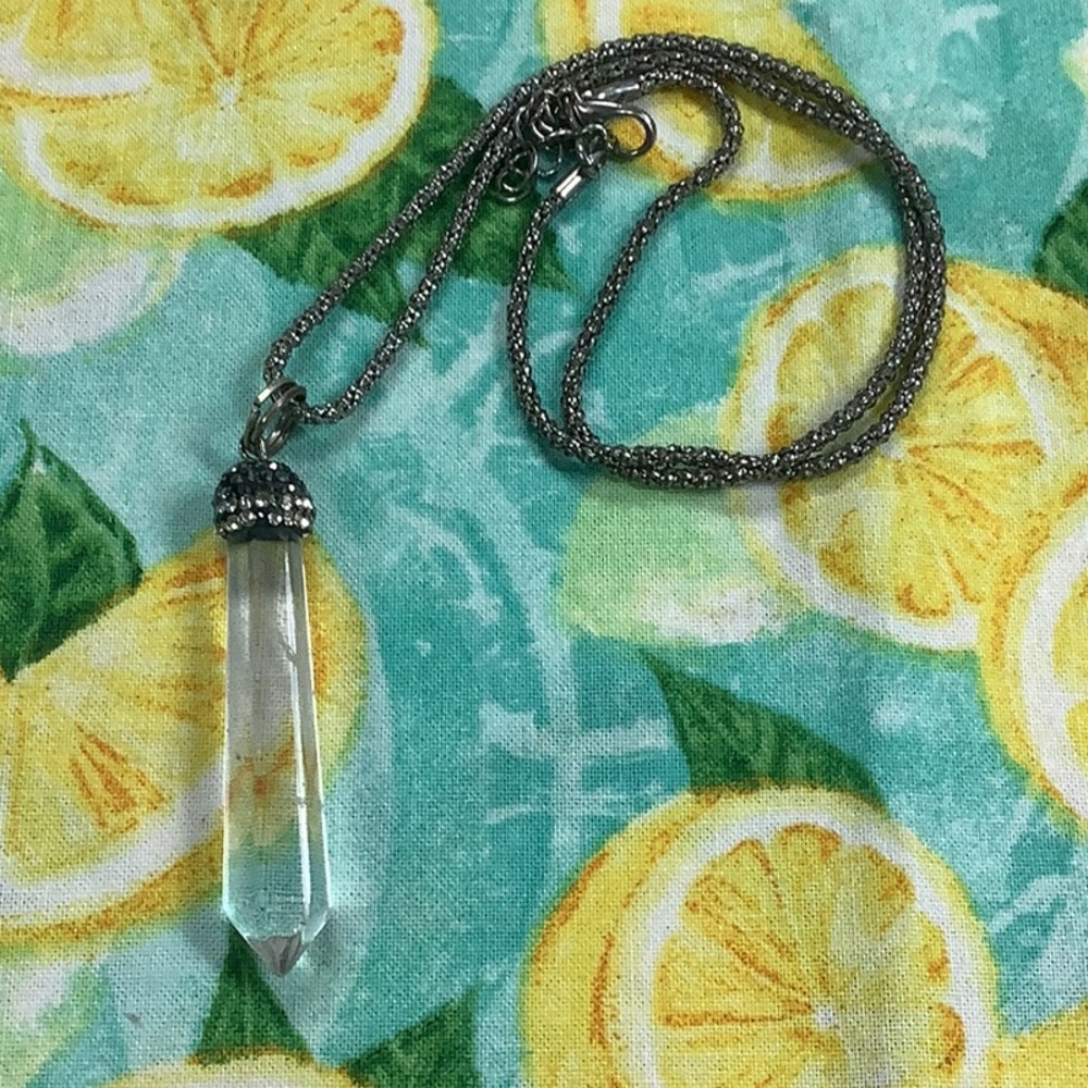 Necklace with crystal pendant with white stones different look.
